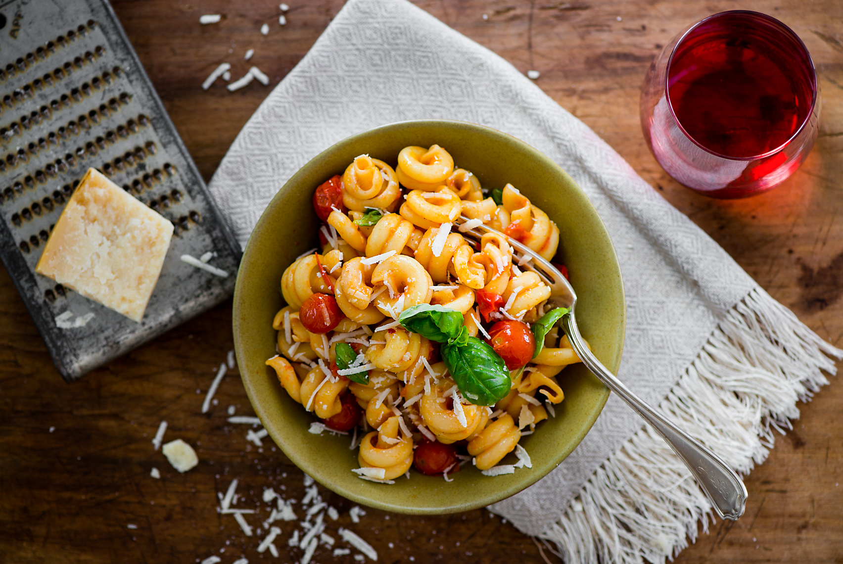 Travel and food photographer, Kristina Krug, based in Seattle, Portland, San Francisco, PNW travel and food photographer, photojournalist, reportage, Washington, Oregon, food, travel, beverage, liquor, photographer. Heirloom tomato five minute pasta sauce with wine. Still life photography for This Old House, EatingWell, editorial food photographer, food stylist, prop stylist, wine, winery, California, San Francisco editorial photographer