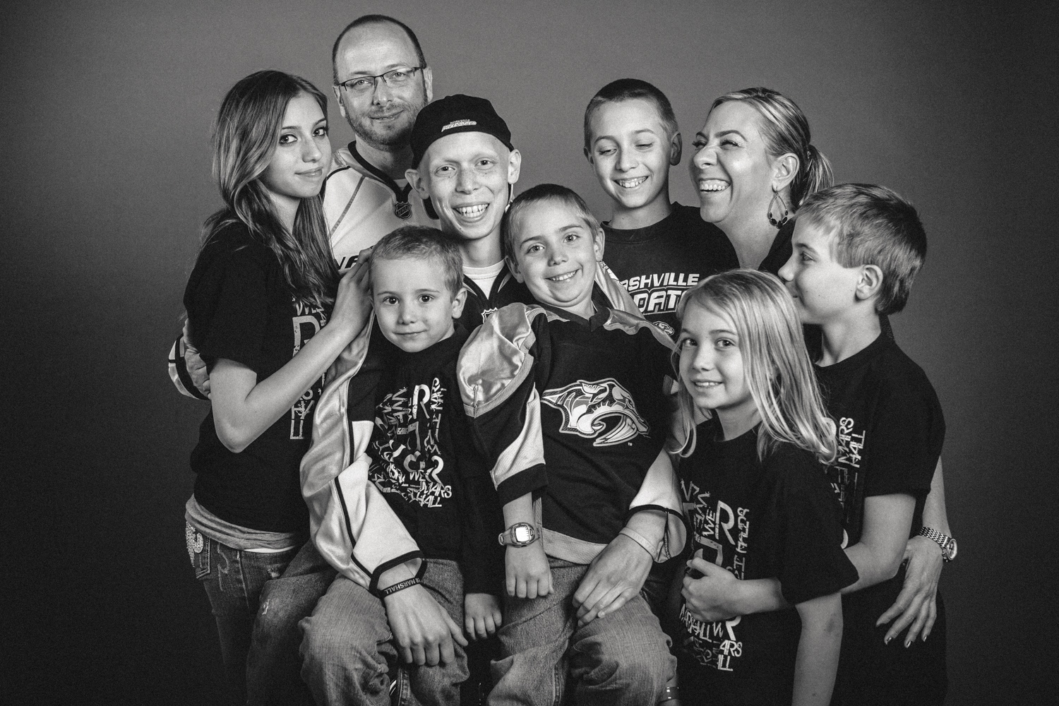 Family support, together, resilience, authentic, love, sports, fans, Nashville, portrait, advertising, photographer, portraiture, portrait studio