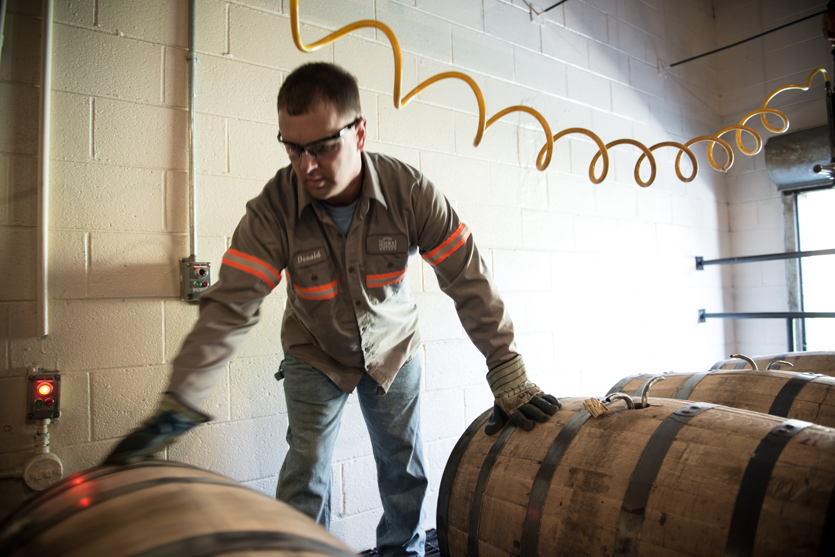 George Dickel Distillery - Tennessee Whiskey, Reportage, Travel, Narrative, Kentucky, Southern, lifestyle, real life, real people, at work, working, stock photography, reportage, Kristina Krug Photographer, Southeast, Chicago, barrels, bourbon, whisky, photojournalist, photojournalism, Travel Photographer, beverage, industrial, industry, agriculture, liquor, lifestyle, beverage photographer, whisky advocate, beer, southern life, whisky, mash, corn, grains, charcoal, filtration, wood, liquor, storyteller, Cascade Springs, Tullahoma, strength, hard work, man, safety, 