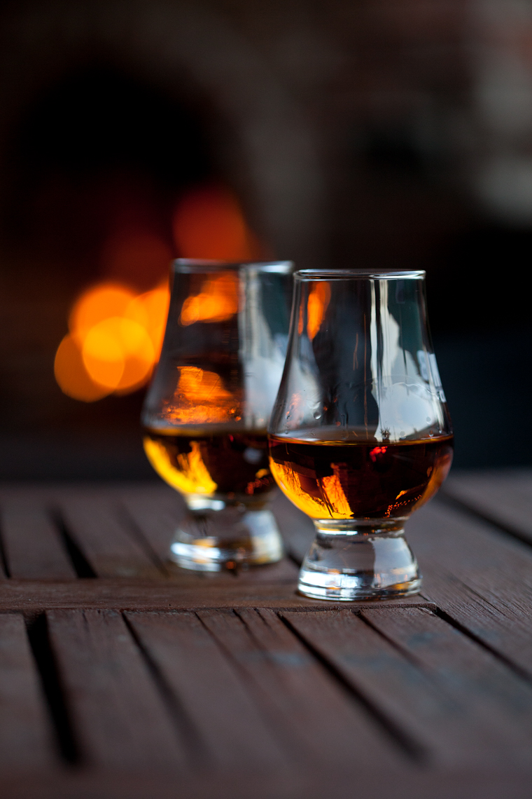 Glasses of bourbon in front of a fire, fire pit, fireplace, Nashville food & beverage photographer, Kristina Krug, Krug Photo, Louisville Beverage Photographer, rustic, tabletop, still life, Louisville, Kentucky, KY, TN, Chicago beverage photographer