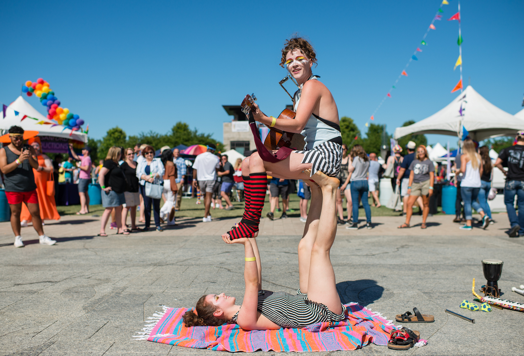 Nashville Pride Festival 2017 | Nashville Photographer + Director, Kristina Krug | authentic, authenticity, bisexual, celebrate, celebration, civil, civil libierties, courage, dancing, documentary, drag, emotions, equality, fearless, festival, festive, free, freedom, friends, fun, gay, happy, journalism, joy, joyful, Kristina Krug, krugphoto, lesbian, LGBT, LGBTQ, liberty, love, love wins, loved, loveislove, loveliness, lovers, lovewins, men, Nashville, National Pride Day, parade, people, photographer, photojournalism, photojournalist, Portrait, Predators, pride, Pride Parade, proud, queen, queer, relationship, reportage, rights, safety, self esteem, self regard, self respect, self-esteem,  self-respect, sexuality, summer, sun, sunny, Tennessee, TN, Transgender, street performers, music, gymnast, circus performers with musical instruments, acrobatic