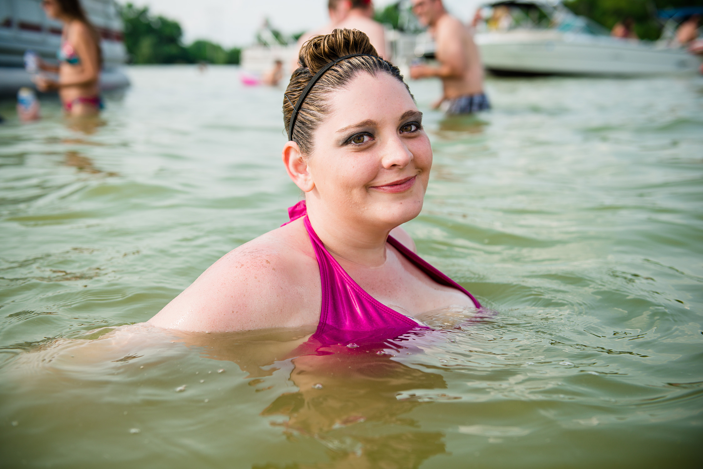 Girl in a Wisconsin lake. Summer, travel, photographer, real people, Madison, Chicago, Nashville, advertising photographer, photojournalist, beverage photographer, liquor, lifestyle photographer 