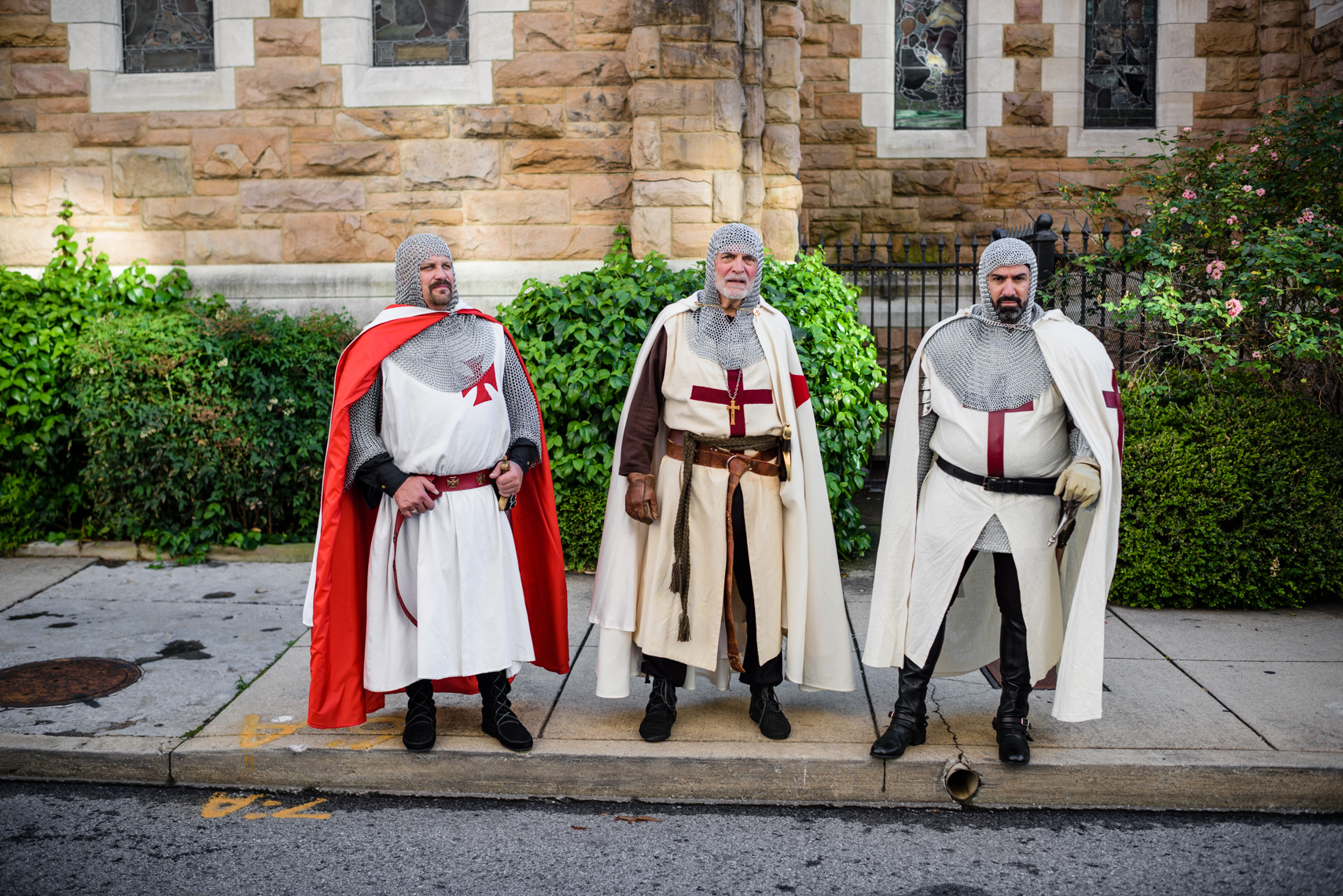 Three members of the medieval order of the Knights Templar wait outside Christ Cathedral Episcopal Church  in Nashville, Tennessee. Environmental portrait for Smithsonian Magazine by Nashville and DC based editorial photographer, Kristina Krug.