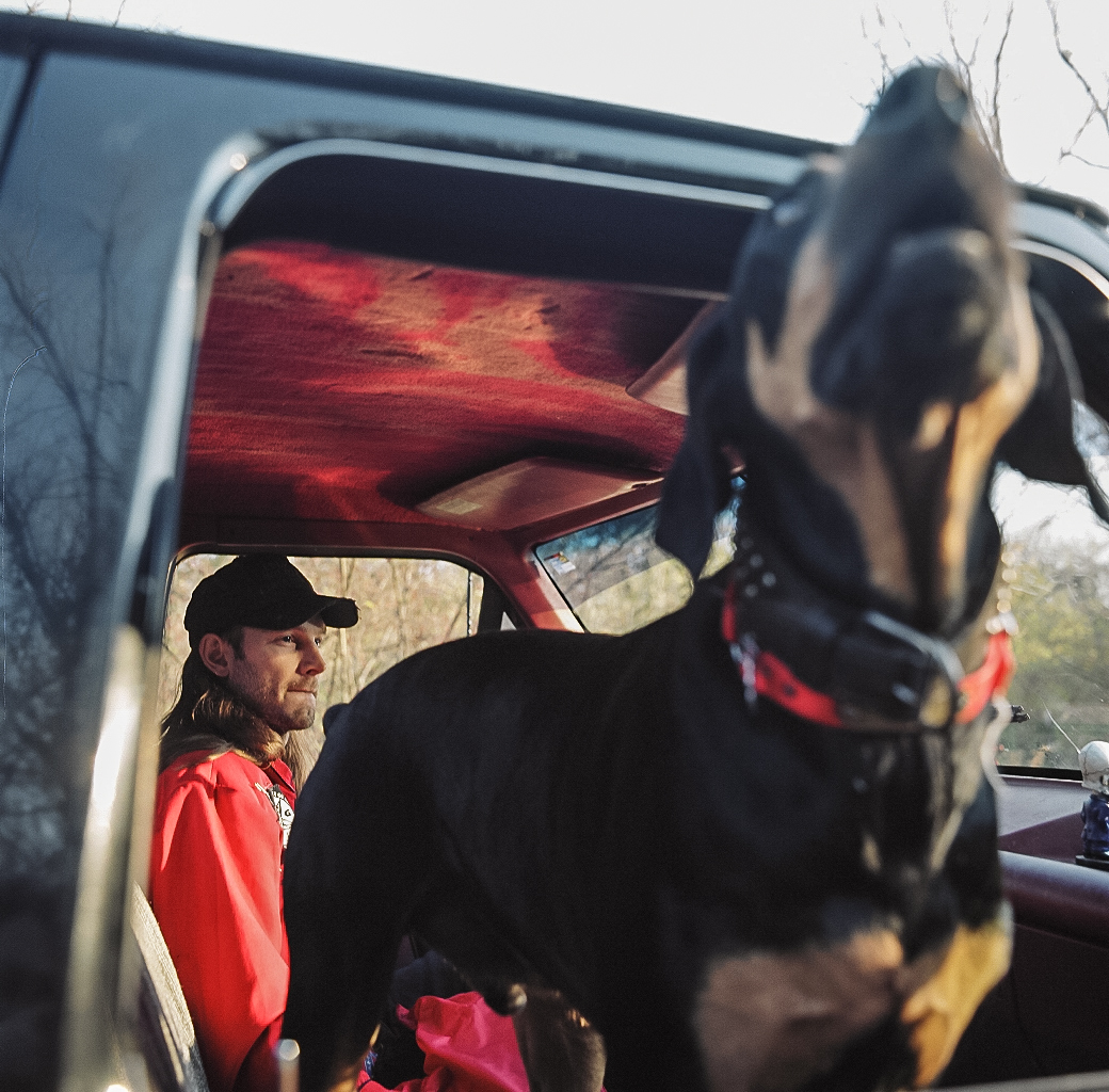 Hank Williams III and his dog, Nashville Tennessee, editorial celebrity portrait photographer, country music photographer, Hank Williams, barking dog, farm