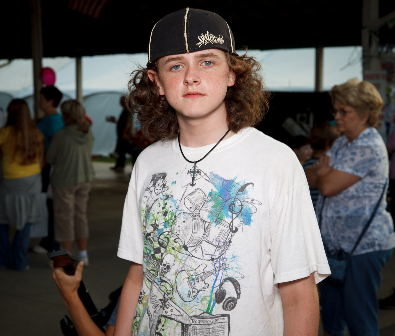 Teen boy guitar hero Wilson County Fair, Lebanon, Tennessee, carnival, amusement park, rural south
